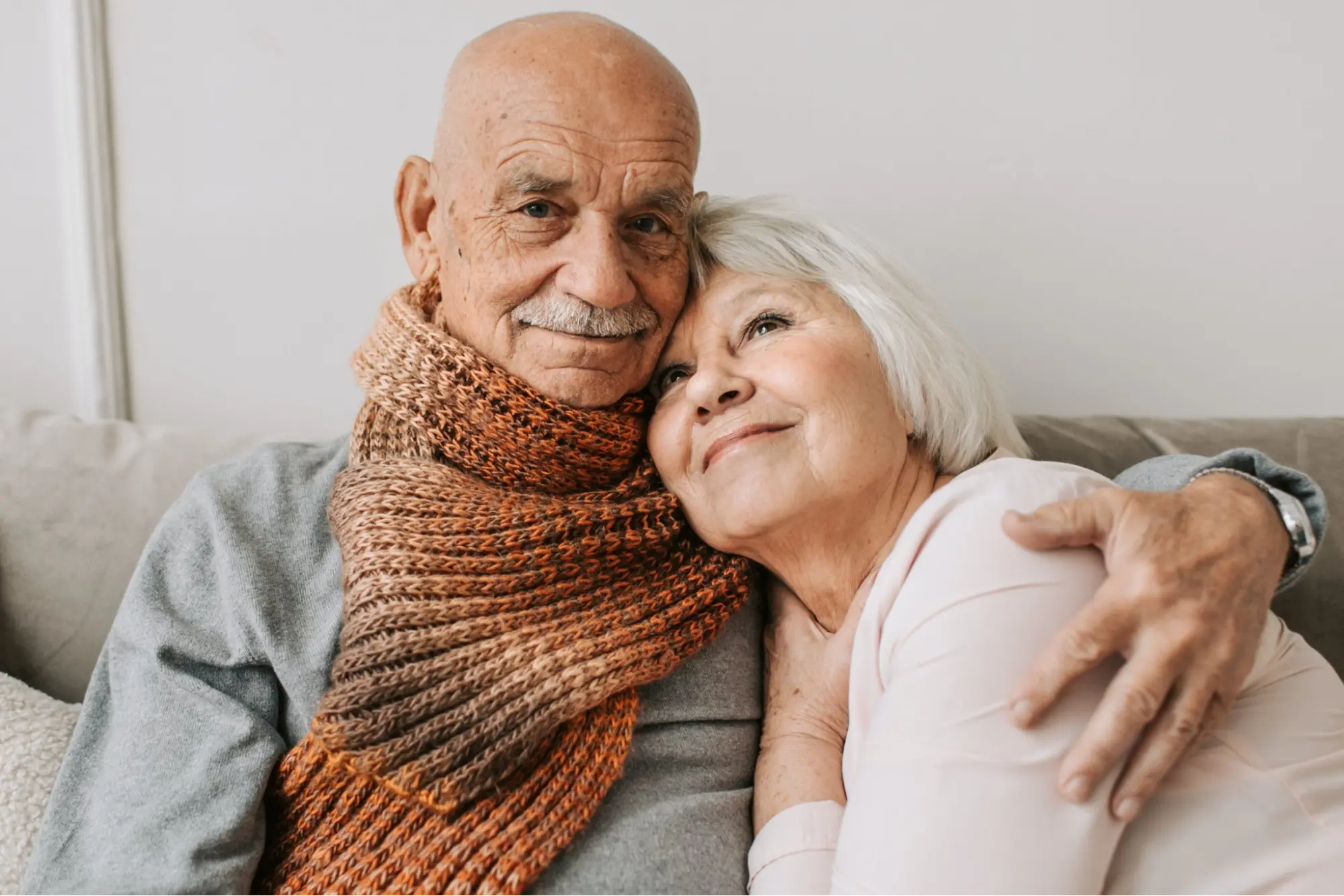 An elderly couple that is happy because their physical therapy is covered by Medicare.